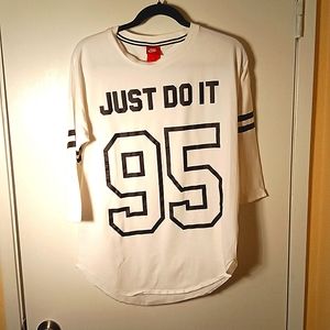 Nike.  JustDo It jersey type shirt  size medium